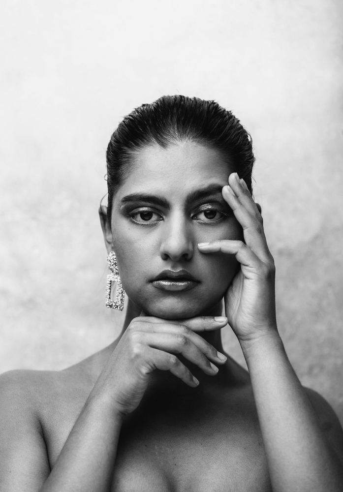 Portrait of a woman resting her hand on her face